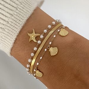 Dazzling 18K Gold Ocean Charm Layered Bracelet Set